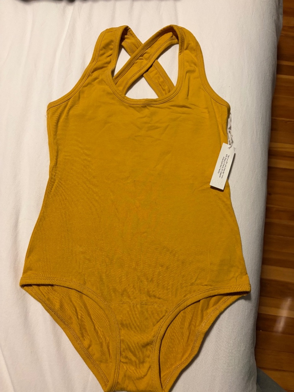 ARQ Cleo Leo leotard in ochre size M, NWT